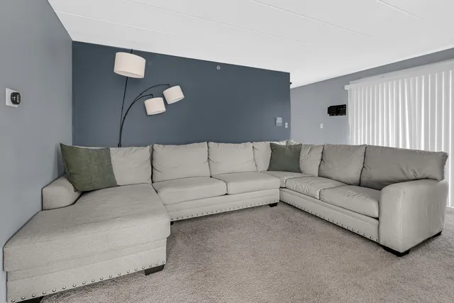 a living room with furniture and a couch