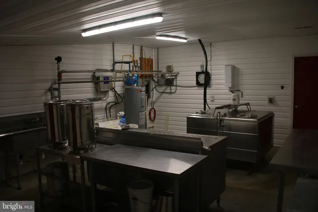 a view of staircase with small racks on the walls