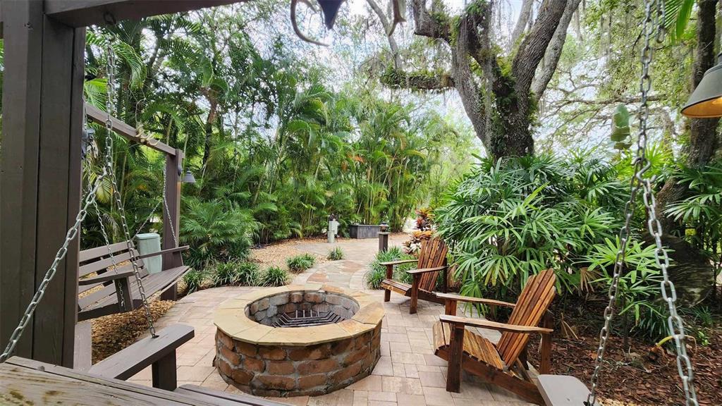 373 Bear Trail River Ranch, FL 33867 - Photo 11 of 14 a table and chairs in the patio