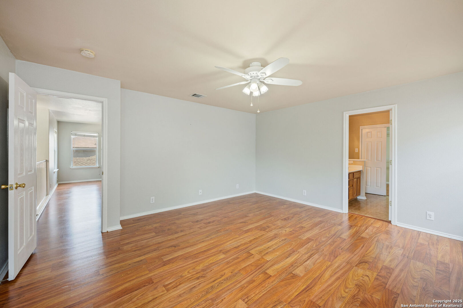 4030 Bear Oak Path San Antonio, TX 78223 - Photo 16 of 31 a view of empty room with wooden floor