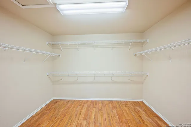 a view of a room with racks on the wall