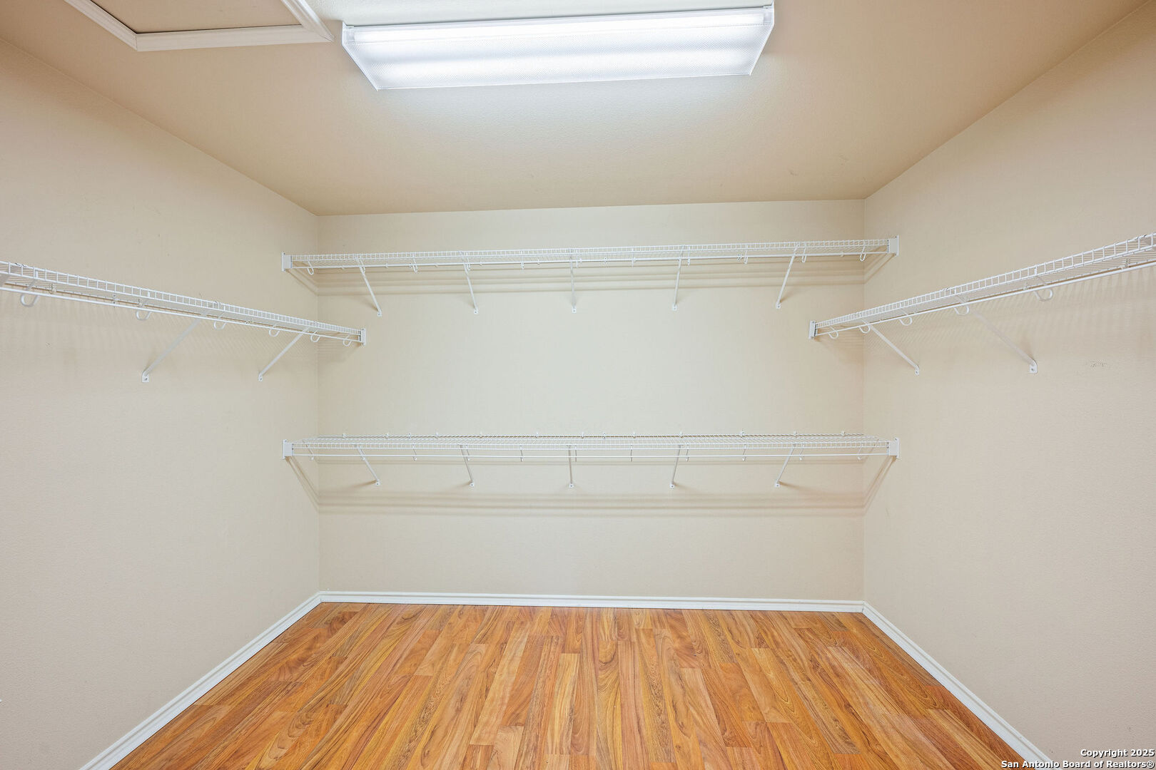 4030 Bear Oak Path San Antonio, TX 78223 - Photo 20 of 31 a view of a room with racks on the wall