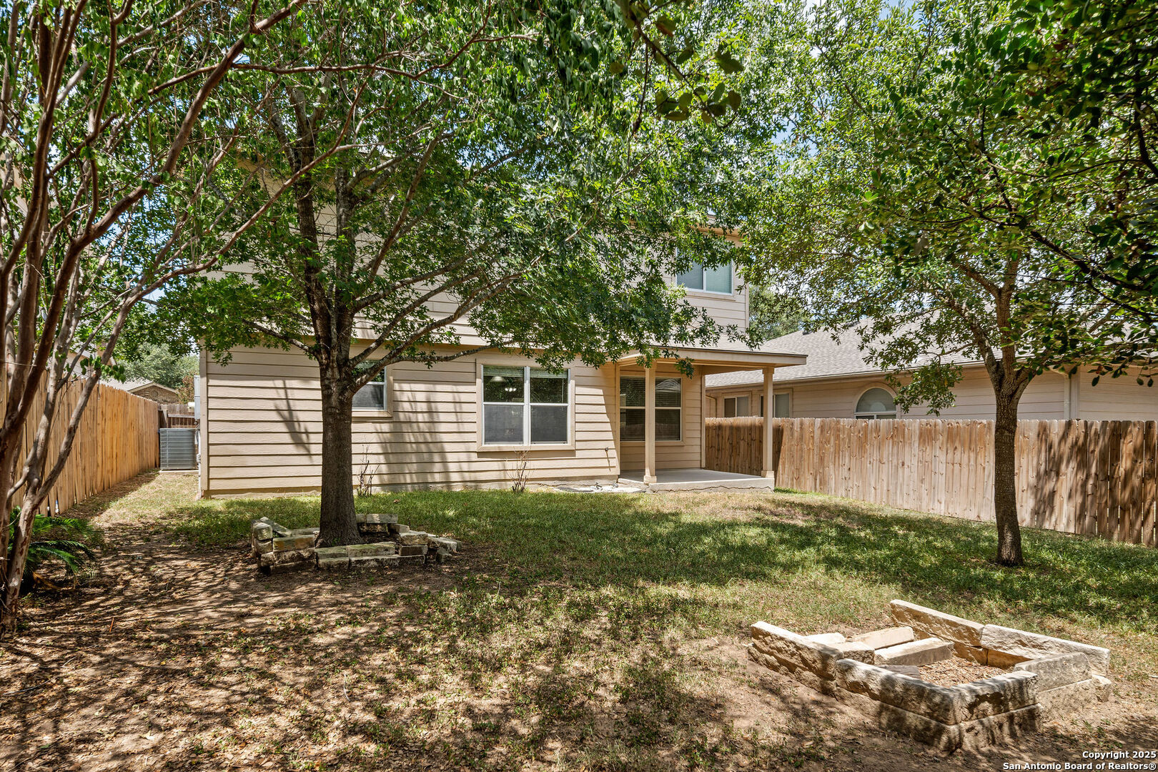 4030 Bear Oak Path San Antonio, TX 78223 - Photo 29 of 31 front view of a house with a yard