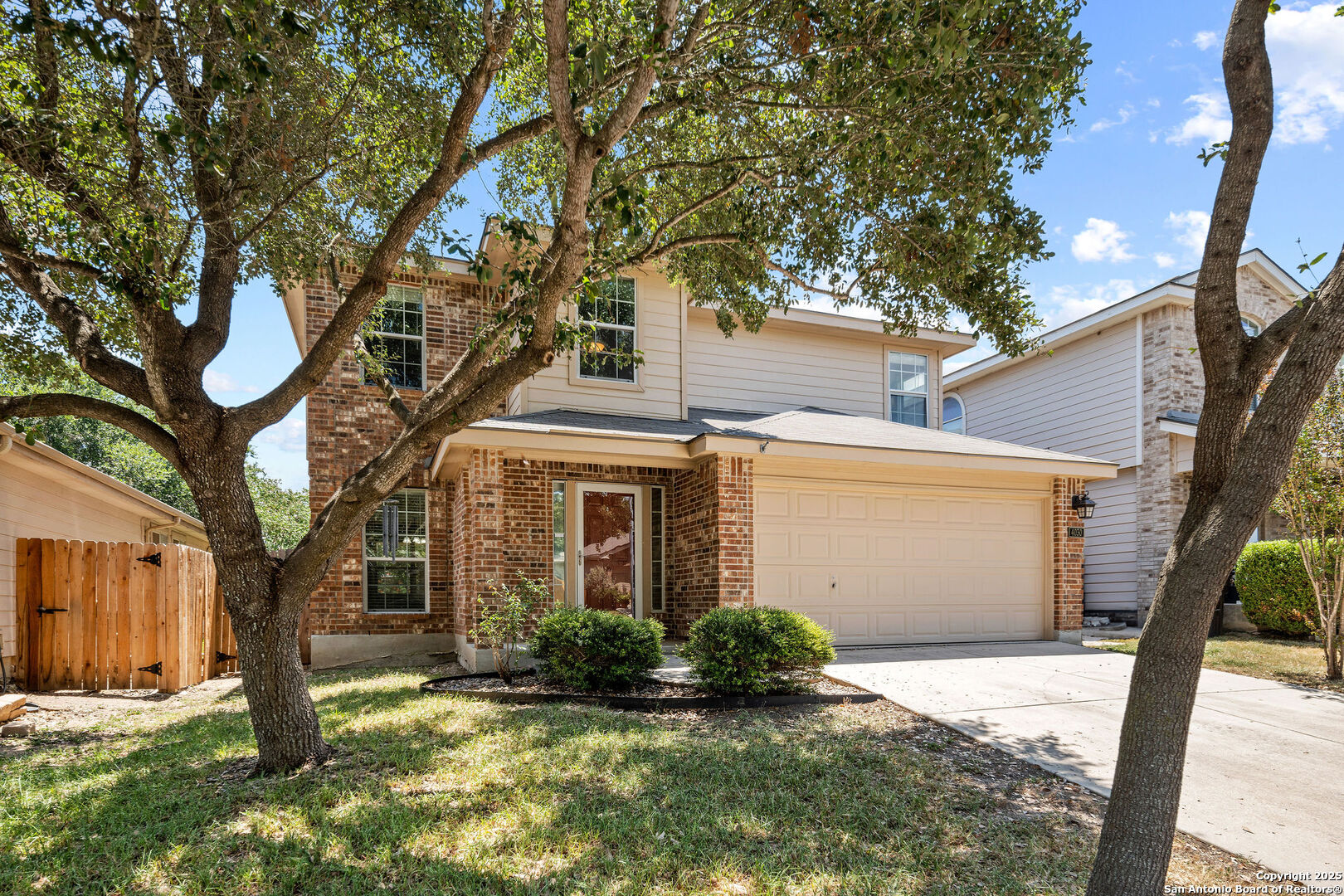 4030 Bear Oak Path San Antonio, TX 78223 - Photo 3 of 31 a view of a house with a yard