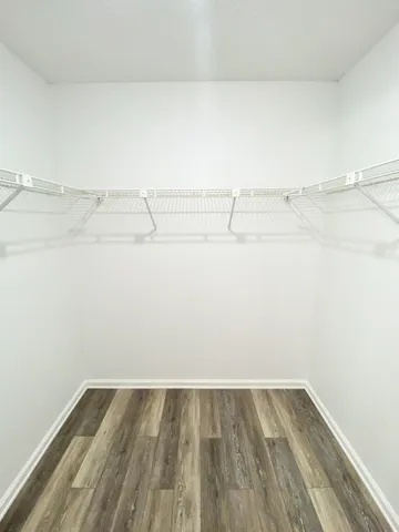 a view of a room with racks on the wall