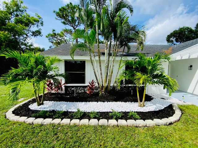 a view of a lake with a house in the background