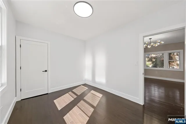 a view of wooden floor in an empty room