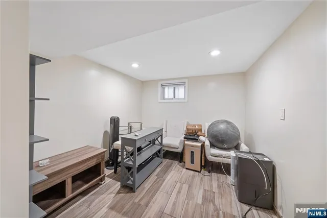 a room with furniture and a wooden floor