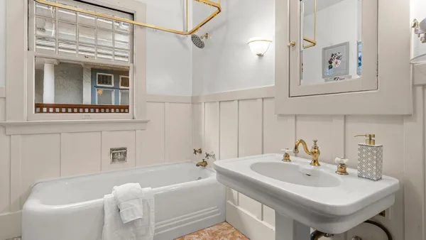 a bathroom with a sink and a bathtub