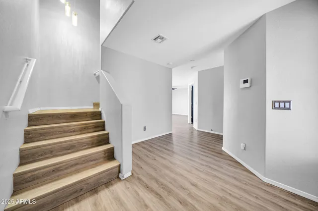 a picture of a bathroom with a shower