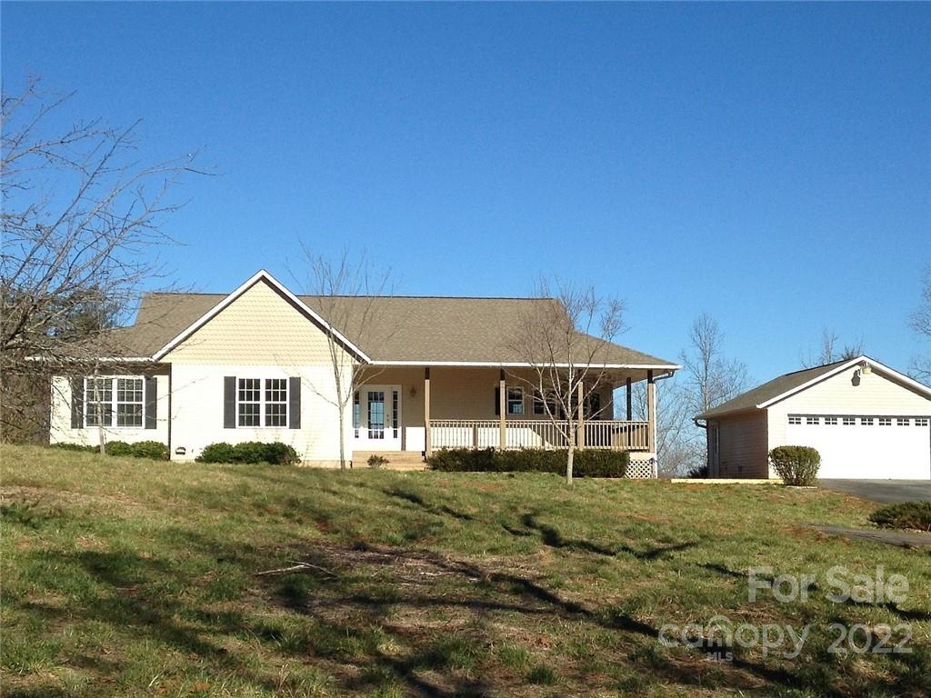 55 Meadow Crest Road Tryon, NC 28782 - Photo 1 of 1 a front view of a house with a yard