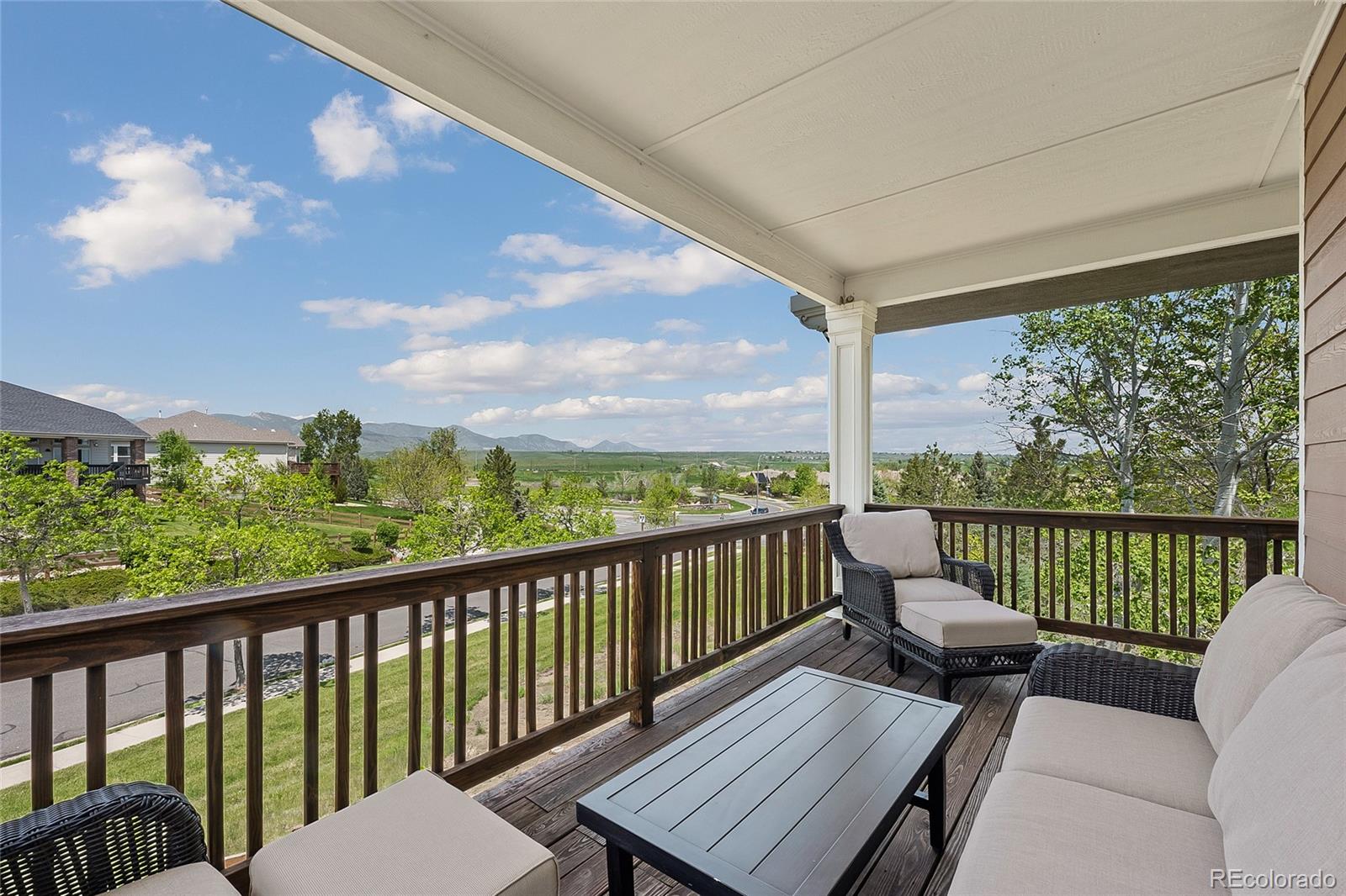 6374 Umber Circle Arvada, CO 80403 - Photo 17 of 33 a view of a two chairs in the deck