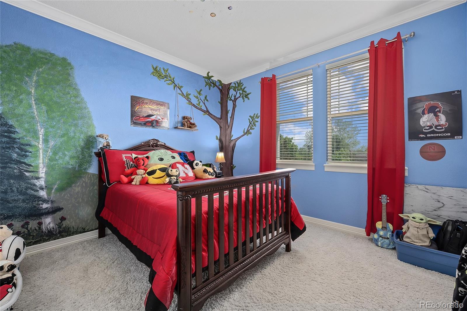 6374 Umber Circle Arvada, CO 80403 - Photo 20 of 33 a bedroom with a bed and a window