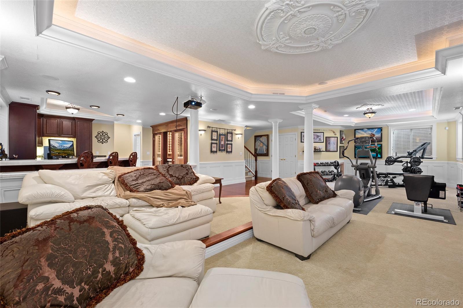 6374 Umber Circle Arvada, CO 80403 - Photo 23 of 33 a living room with furniture and a large window