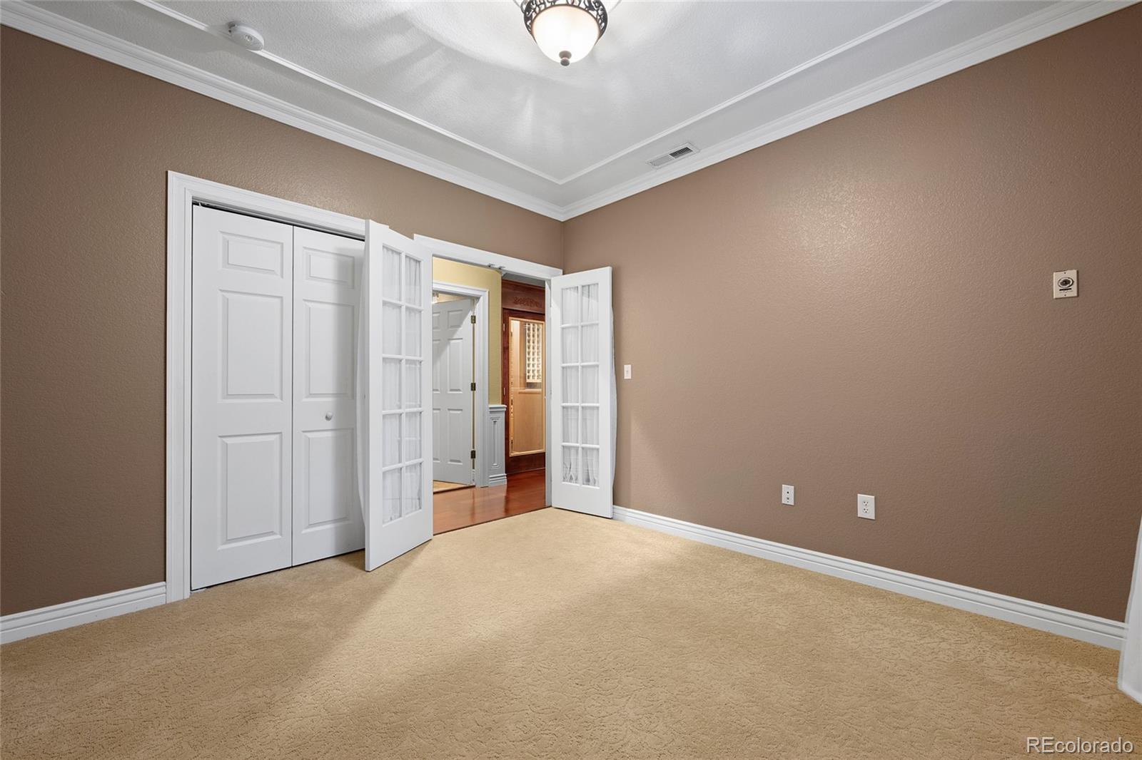 6374 Umber Circle Arvada, CO 80403 - Photo 29 of 33 a view of an empty room with windows