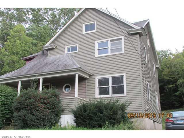 537 Riverside Avenue Torrington, CT 06790 - Photo 1 of 1 a front view of a house with a garden