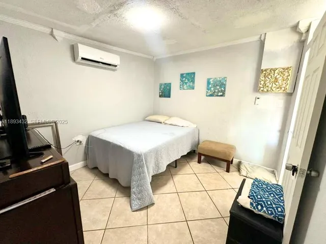 a bathroom with a sink toilet and vanity