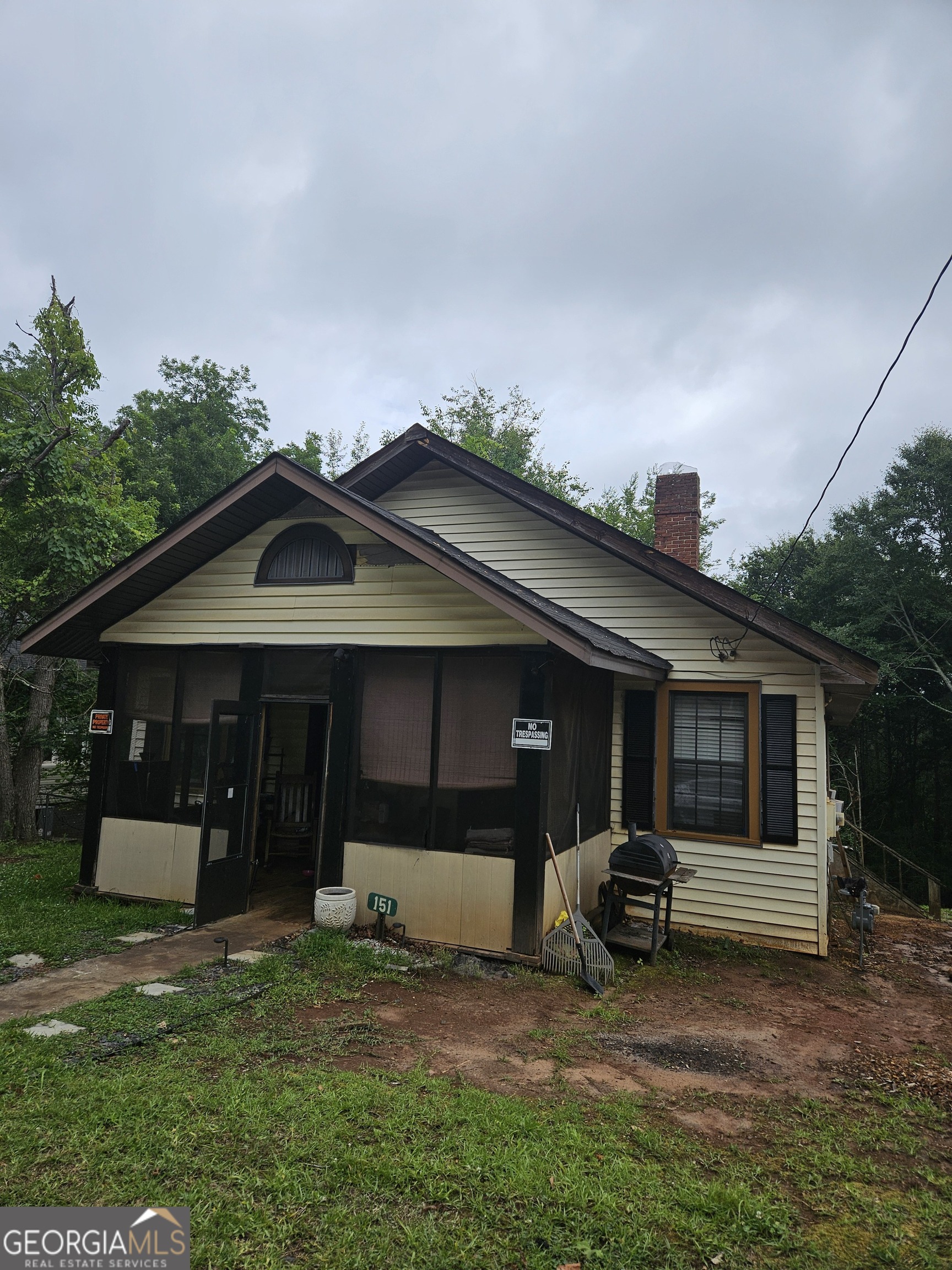 151 G Circle Thomaston, GA 30286 - Photo 2 of 3 a view of a house with backyard and porch