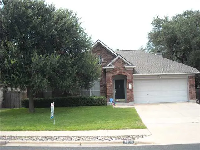 a house view with a backyard