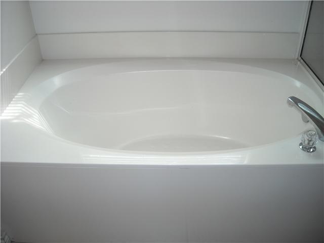 7600 Amanda Ellis Way Austin, TX 78749 - Photo 15 of 22 a close up of a bathtub