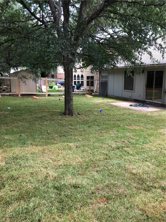 7600 Amanda Ellis Way Austin, TX 78749 - Photo 22 of 22 a house view with a sitting space and garden