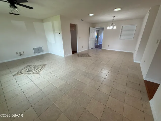 an empty room with a bathroom