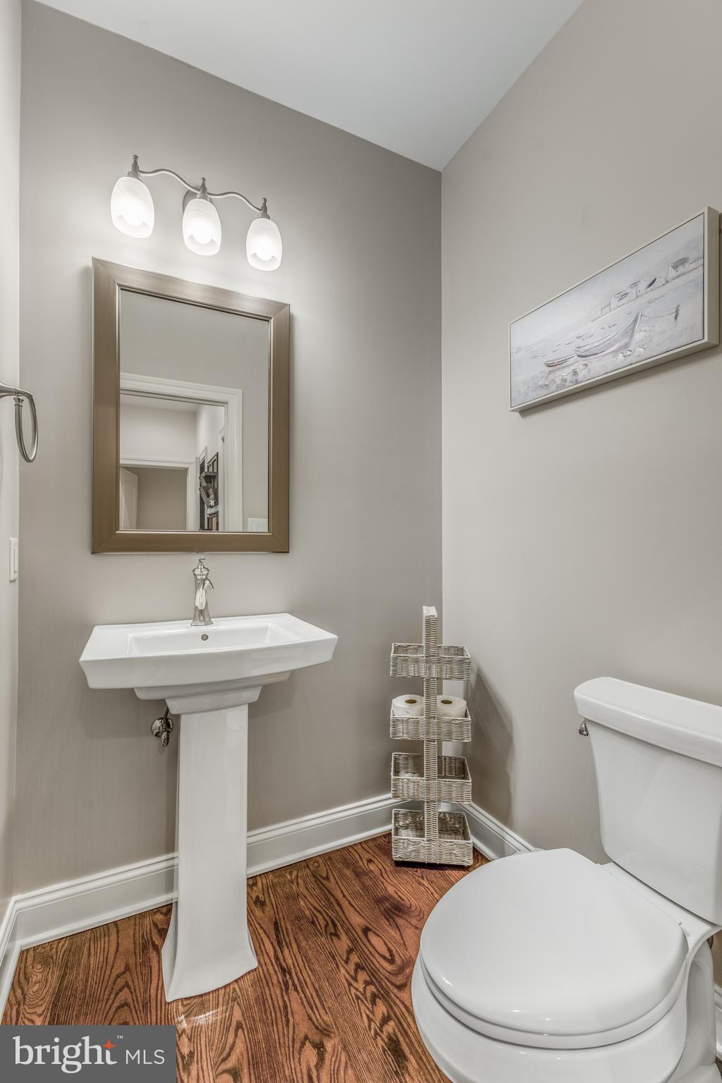 156 Brothers Court Port Matilda, PA 16870 - Photo 35 of 98 a bathroom with a sink a toilet and mirror