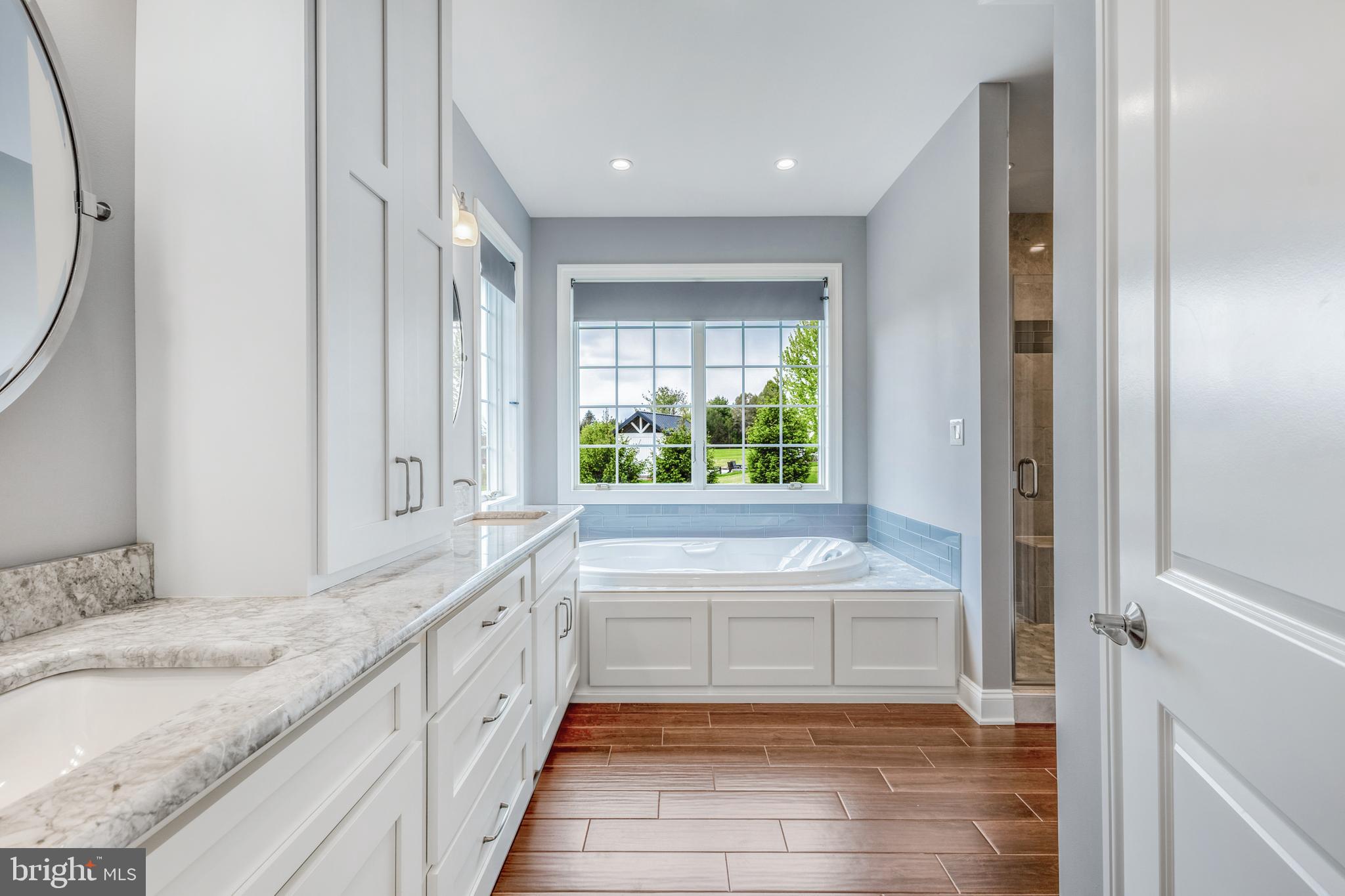 156 Brothers Court Port Matilda, PA 16870 - Photo 43 of 98 a bathroom with a granite countertop tub and a sink