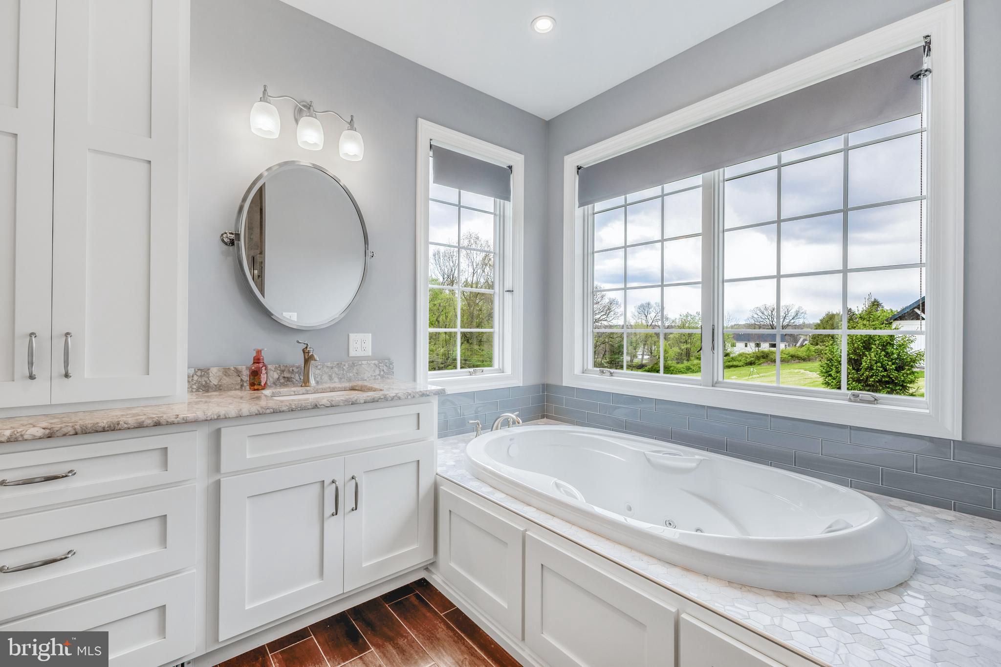 156 Brothers Court Port Matilda, PA 16870 - Photo 44 of 98 a bathroom with a granite countertop sink mirror and a bathtub