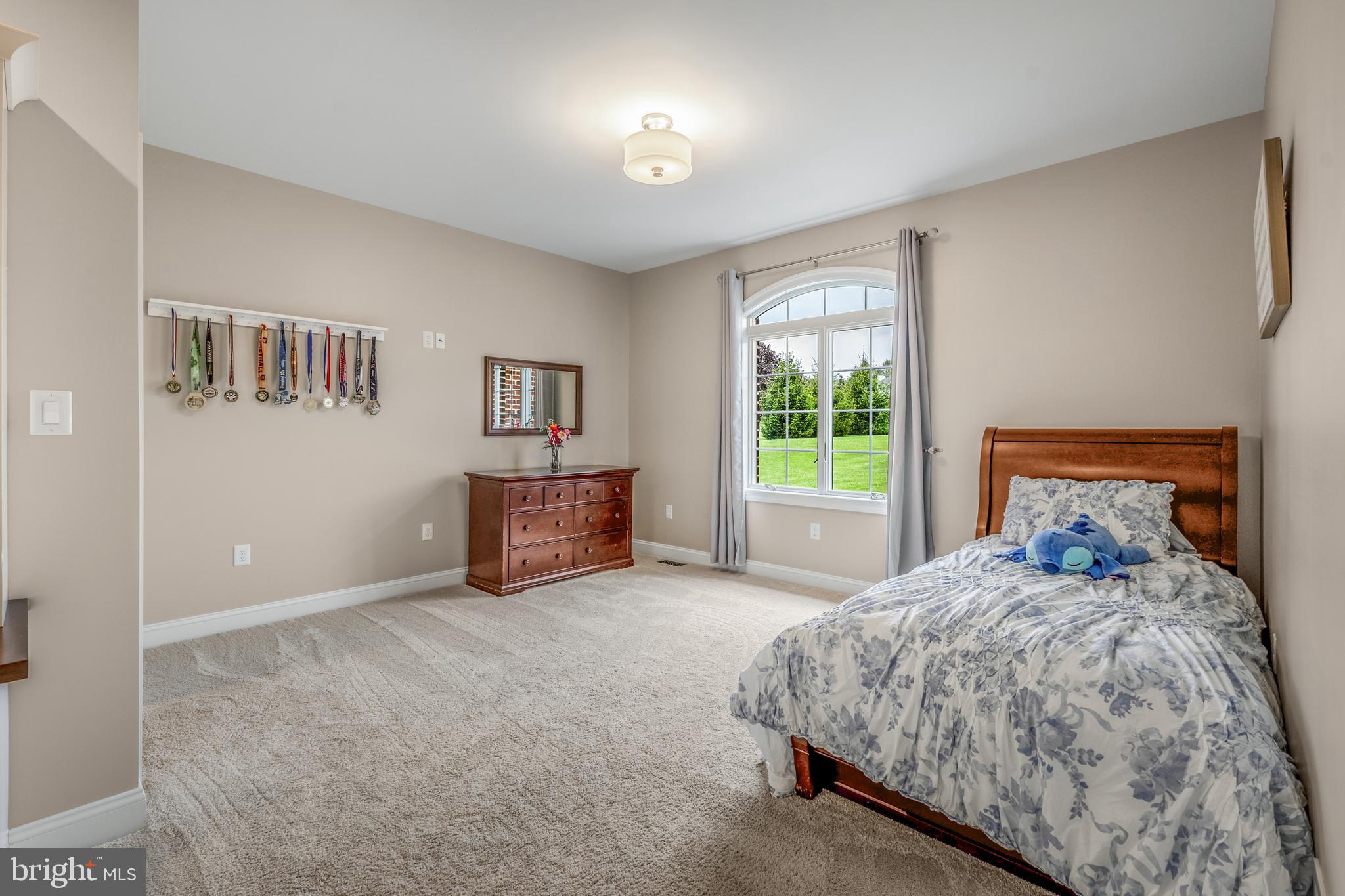 156 Brothers Court Port Matilda, PA 16870 - Photo 52 of 98 a bedroom with a bed and a window