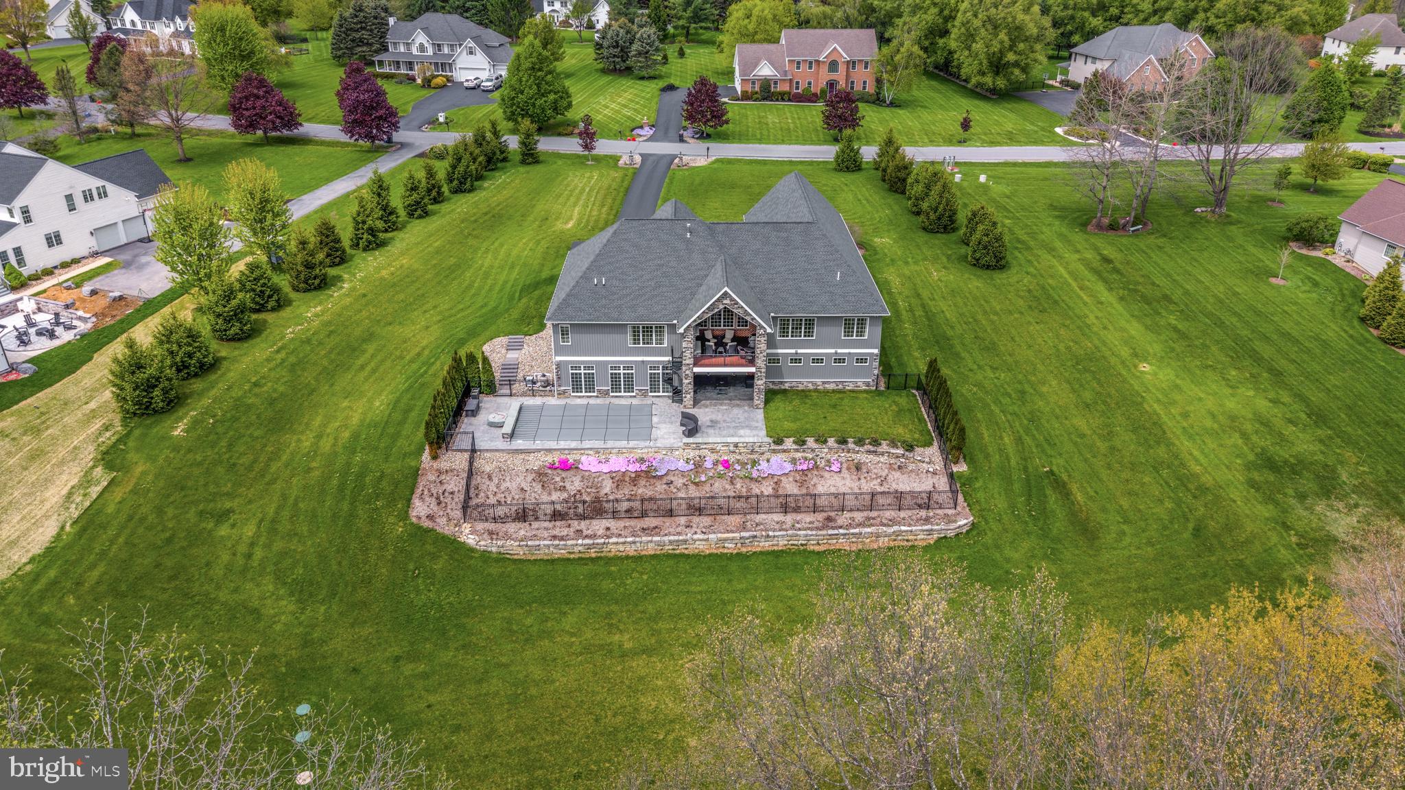 156 Brothers Court Port Matilda, PA 16870 - Photo 85 of 98 a view of a house with a big yard and potted plants