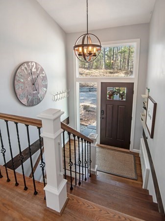 552 Lowell Road Groton, MA 01450 - Photo 23 of 42 a view of an entryway with wooden floor