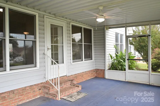 a view of house with backyard