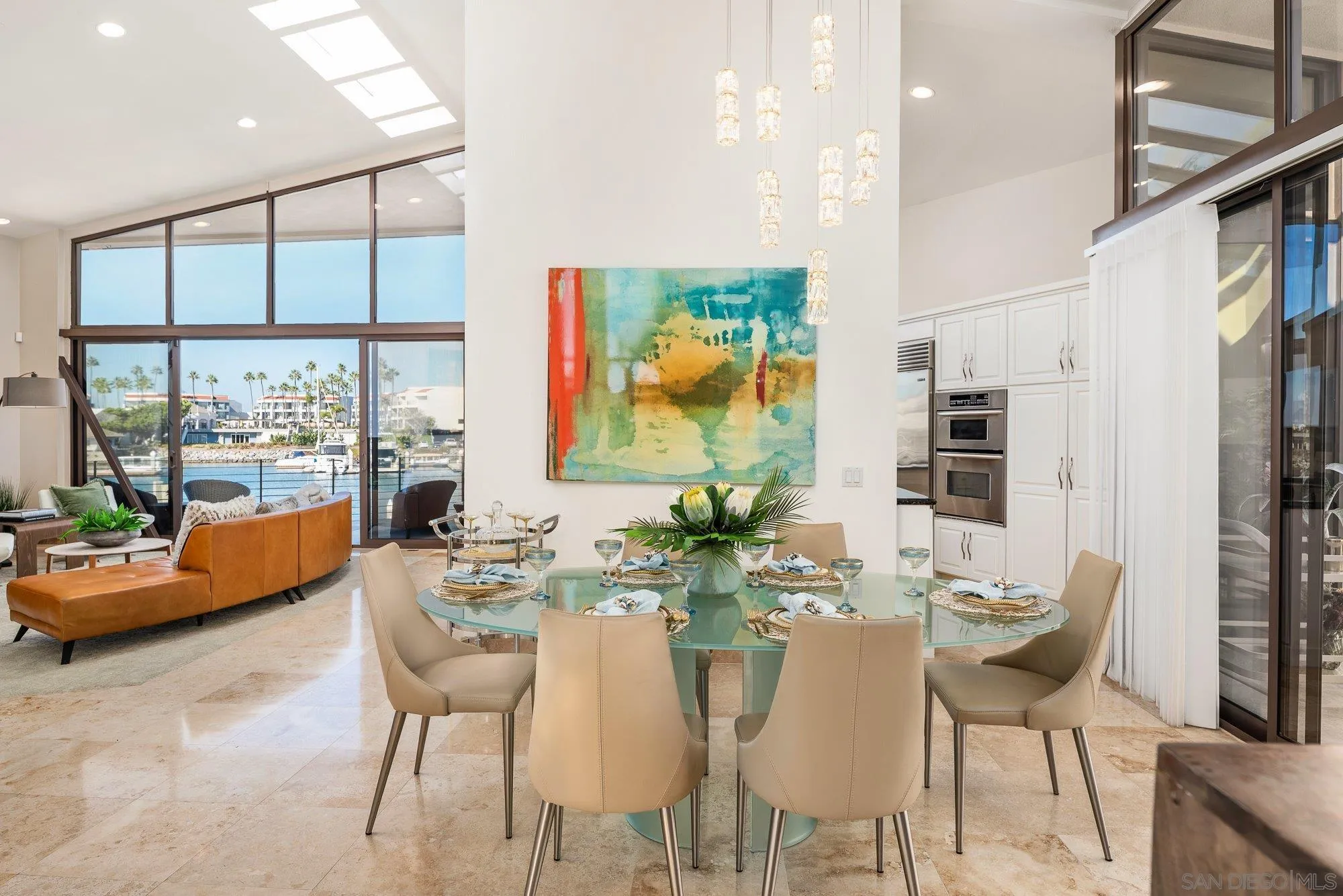 25 The Point Coronado, CA 92118 - Photo 27 of 74 a view of a dining room with furniture water view and wooden floor