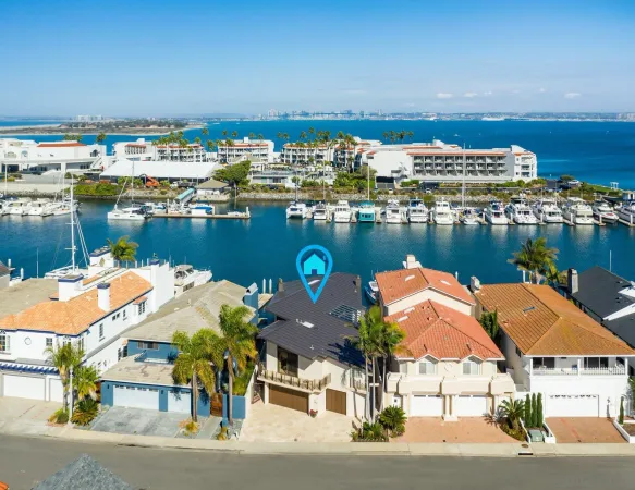 a house with palm tree in front of it