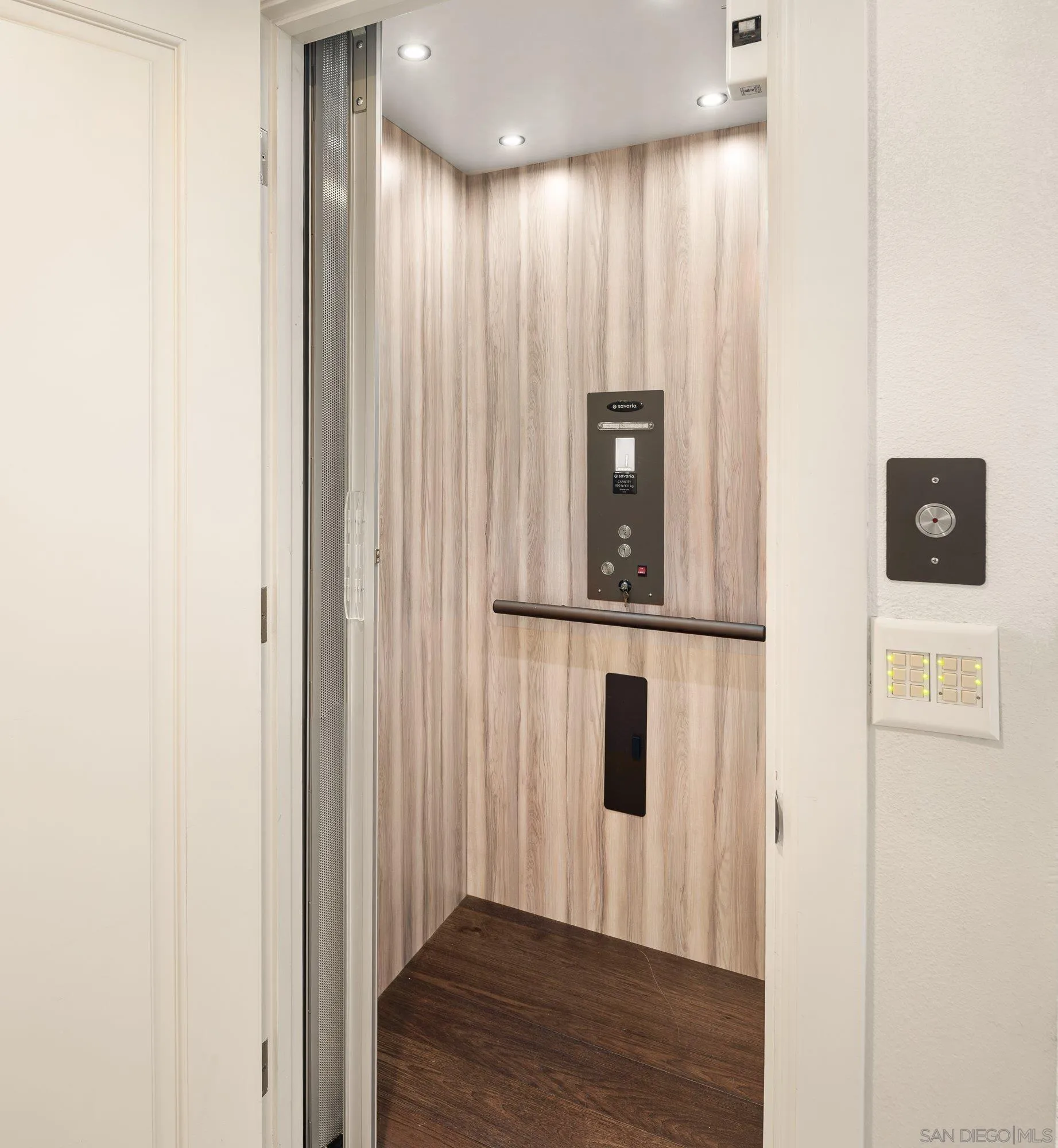 25 The Point Coronado, CA 92118 - Photo 38 of 74 a view of a hallway with wooden floor and staircase