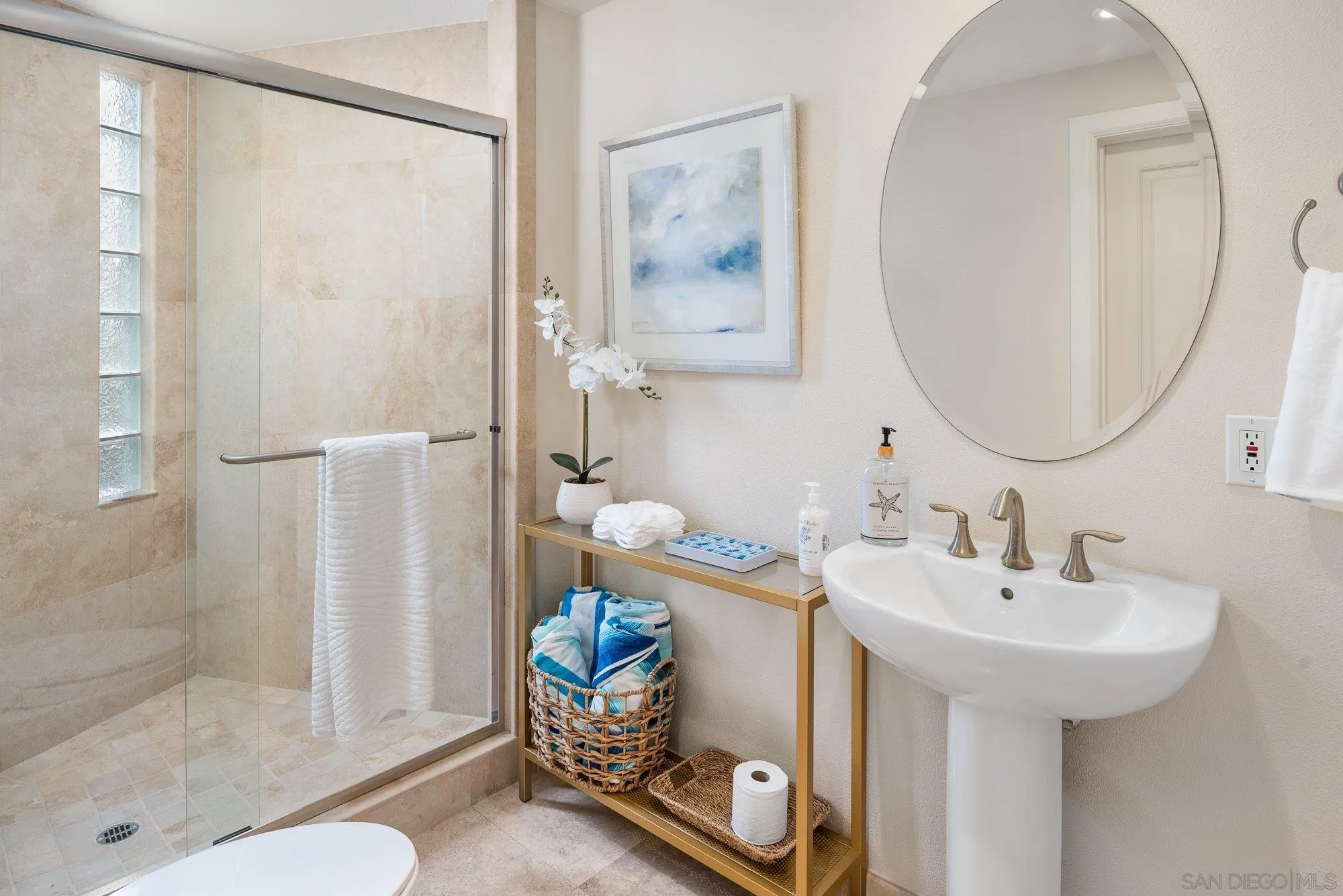 25 The Point Coronado, CA 92118 - Photo 52 of 74 a bathroom with a sink toilet and shower