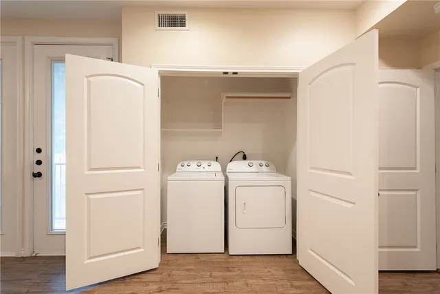 a utility room with dryer and washer