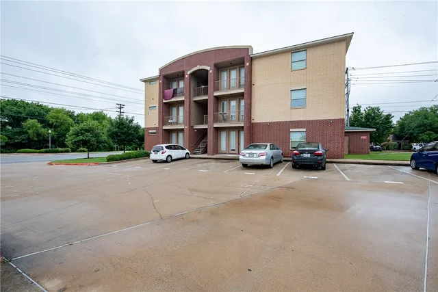 a view of a street with cars