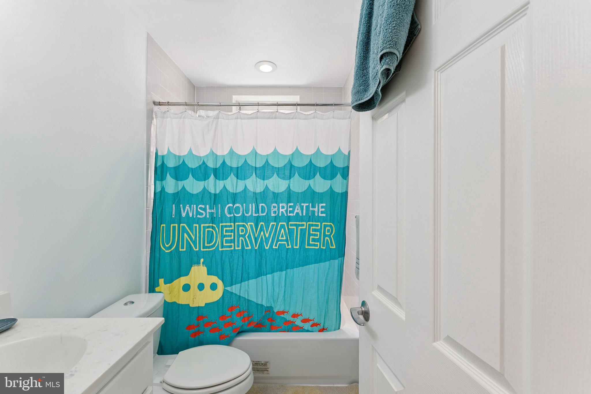 1440 Columbia Road Northwest, Unit 204 Washington, DC 20009 - Photo 17 of 23 a bathroom with a sink toilet and bathtub