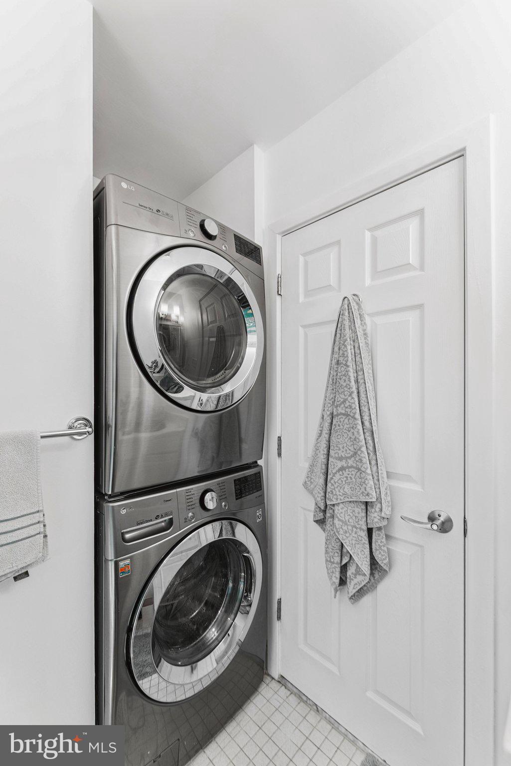 1440 Columbia Road Northwest, Unit 204 Washington, DC 20009 - Photo 19 of 23 a utility room with dryer and washer