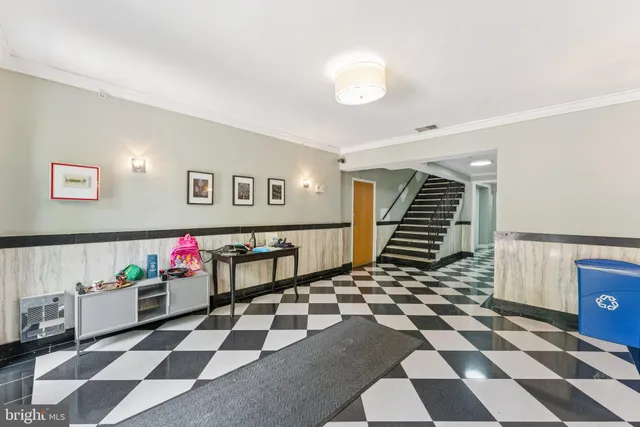 a view of a black and white checkered wall