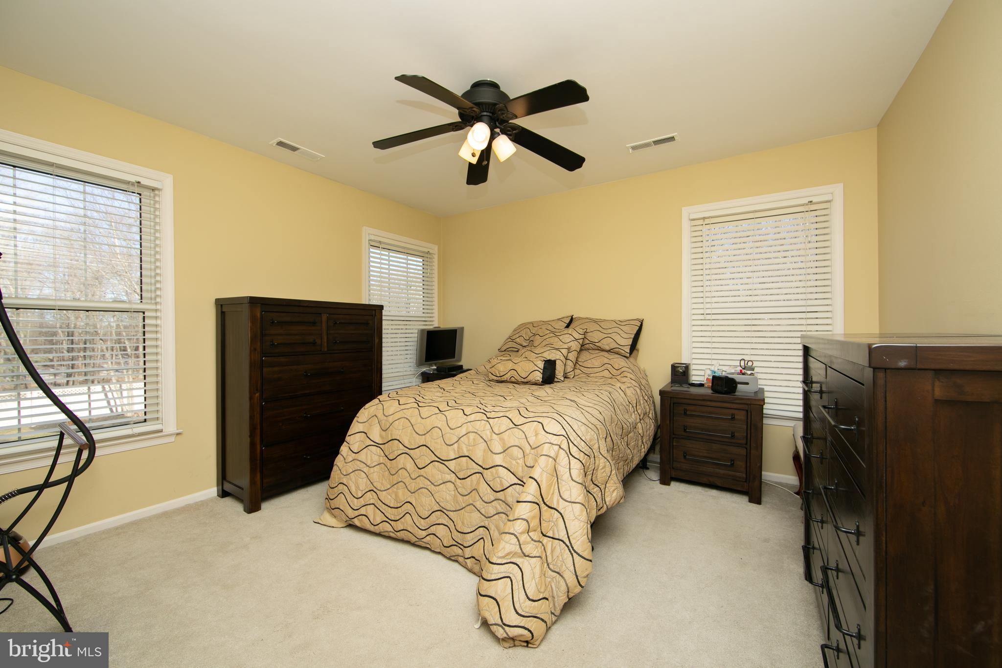 23 Fulton Drive Mount Laurel, NJ 08054 - Photo 38 of 46 a bedroom with a bed and wooden floor