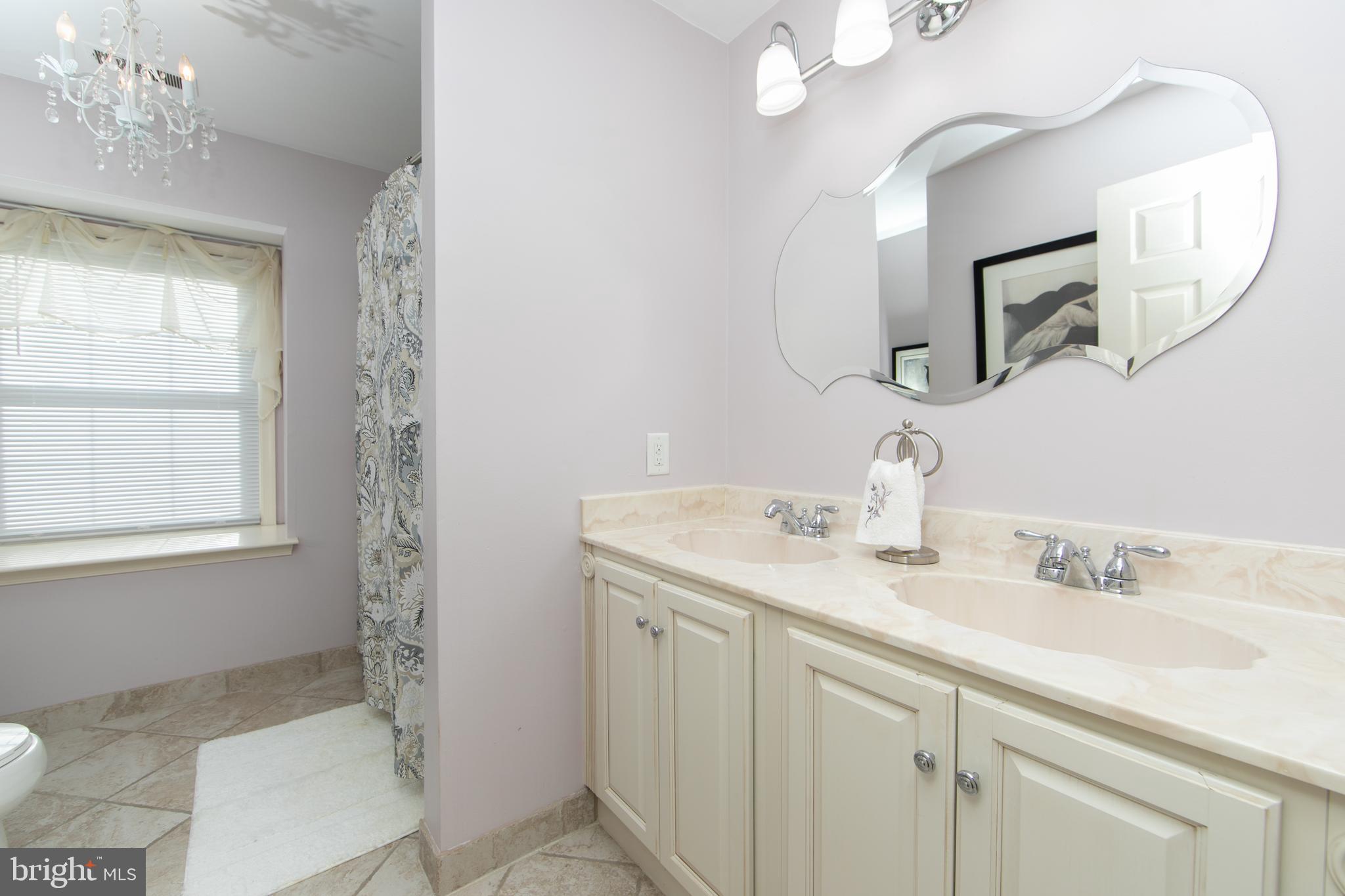 23 Fulton Drive Mount Laurel, NJ 08054 - Photo 44 of 46 a bathroom with a sink and a mirror