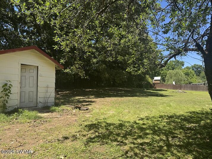 5 Clearview Avenue Trezevant, TN 38258 - Photo 15 of 17 a view of a house with a yard