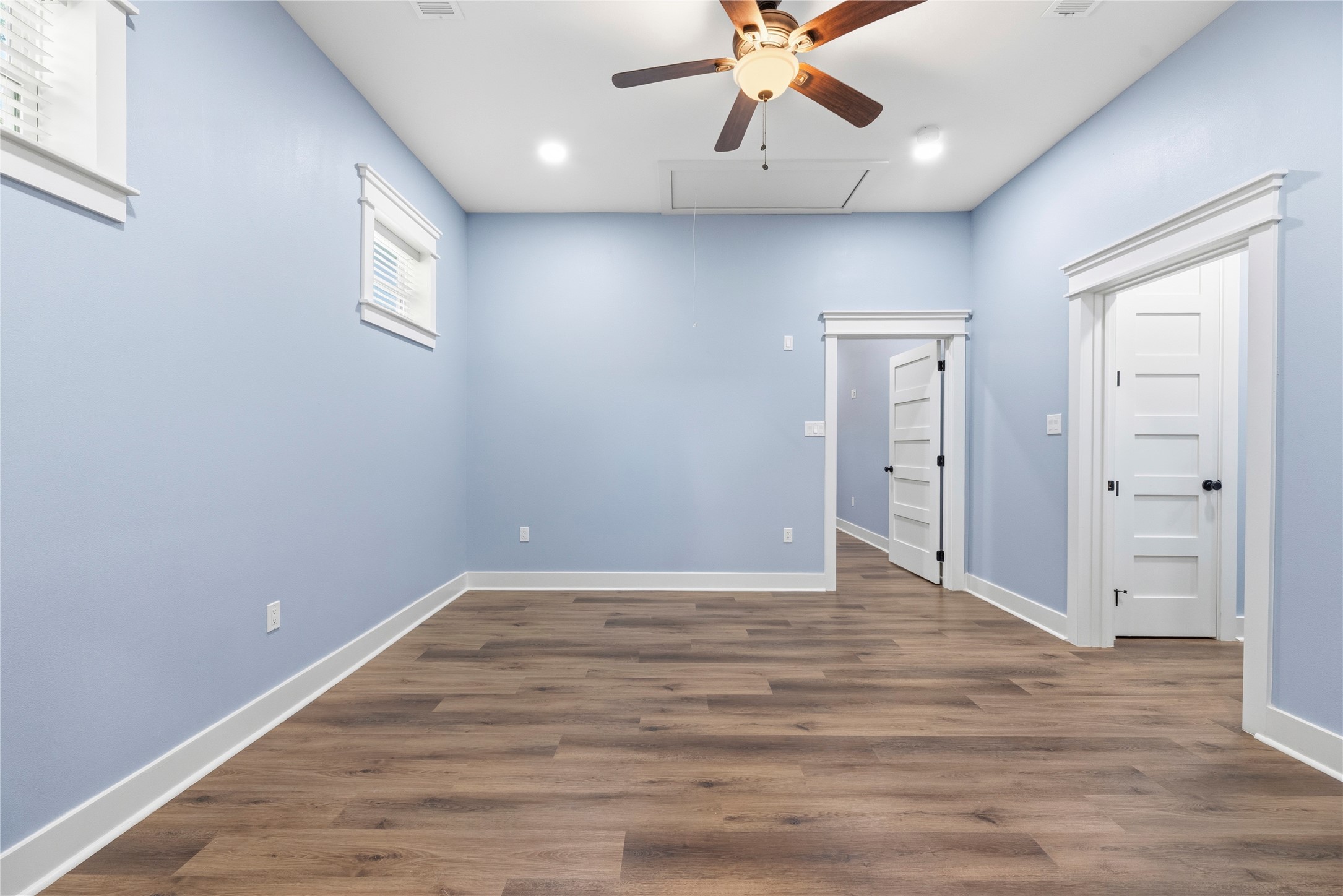 4607 Clayhead Road Richmond, TX 77406 - Photo 30 of 49 Peaceful bedroom retreat within the private living quarters featuring elevated ceilings, soft natural light, and spacious accommodations.