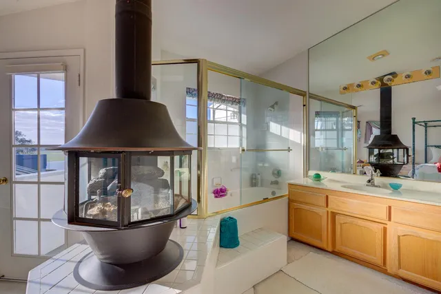 a very nice looking room with a sink and a window