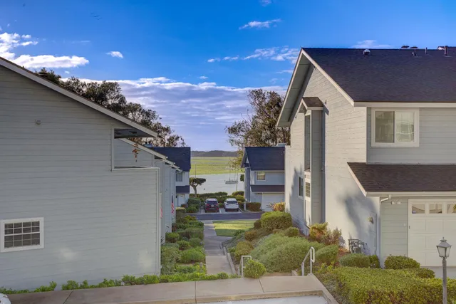 a aerial view of a house with a yard
