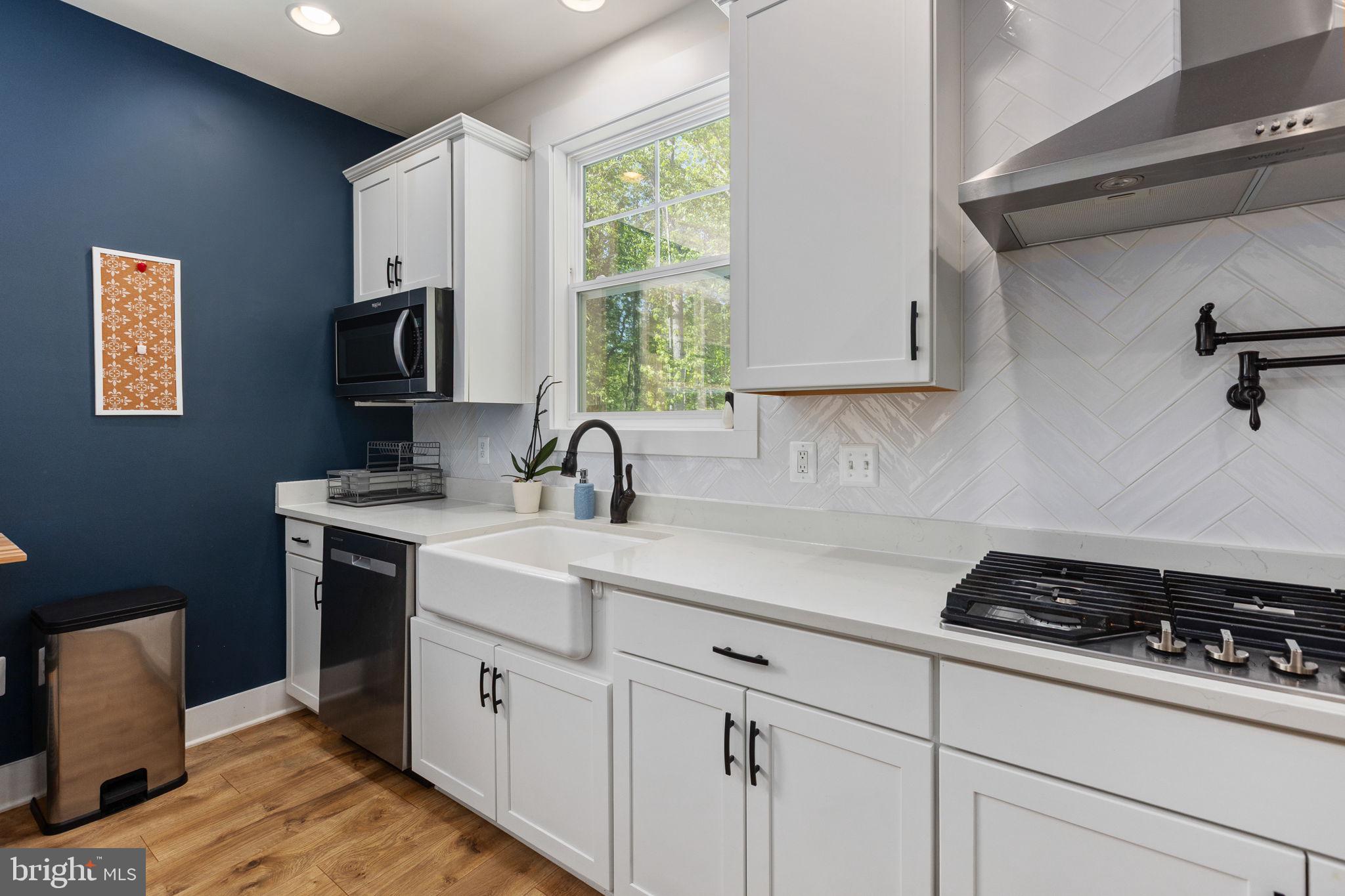 52 Acorn Ridge Court Fredericksburg, VA 22406 - Photo 34 of 101 Farmhouse Sink with Herring Bone Tile Backsplash