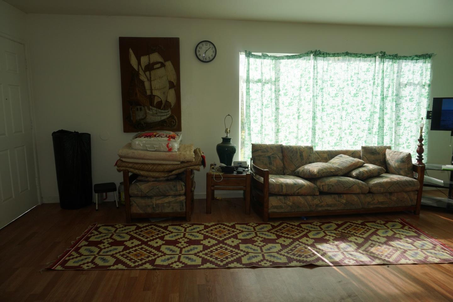2310 Mt Pleasant Road San Jose, CA 95148 - Photo 4 of 12 a living room with furniture and a large window